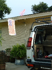 Taller whip antenna clears roofrack (pink streamers at the top of it)