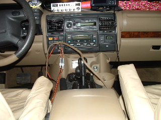 The tan rubber trim thingy that I need to put back is resting partially on the gear shifter: